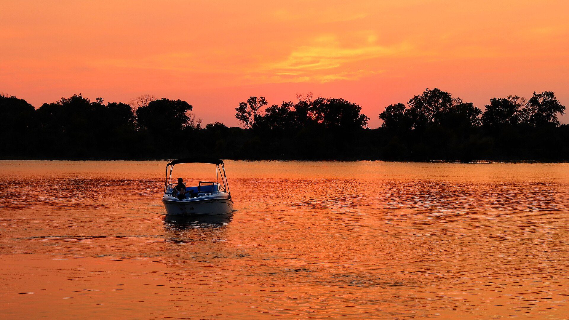 Boat on Lake Whitney, Texas, at sunset